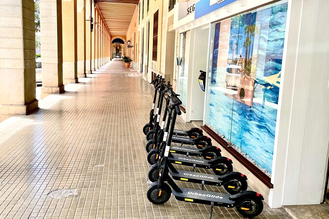1.5 H Electric Kick-Scooter Tour - Cathedral de Mallorca, then Palau de l’Almudaina: the finale you’ll remember