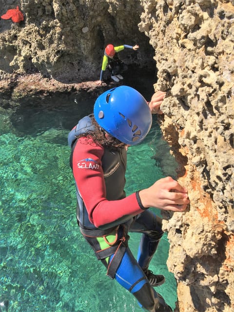 Alcudia: Coasteering Cliff Jumping - Snorkeling, sea-wall climbing, and water-cave exploration