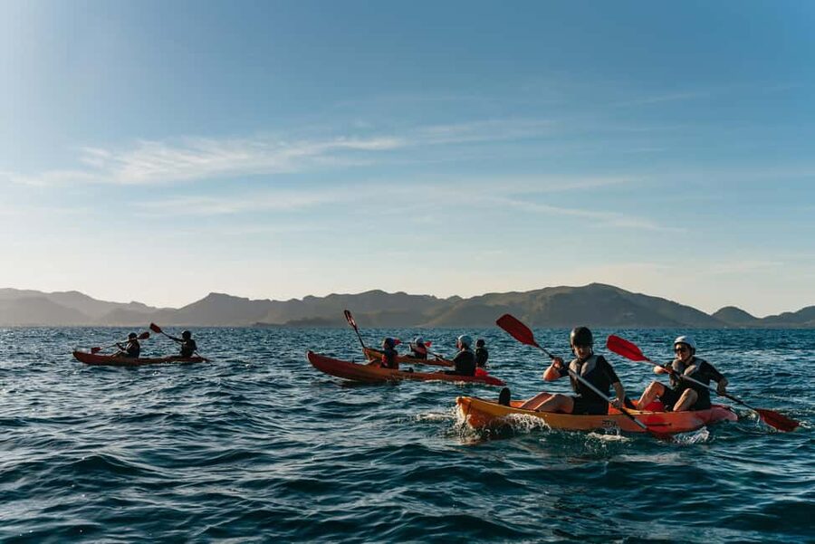 Alcudia: Guided Sea Kayaking Tour with Snorkeling - Safety, sea conditions, and what the guide does when it gets choppy
