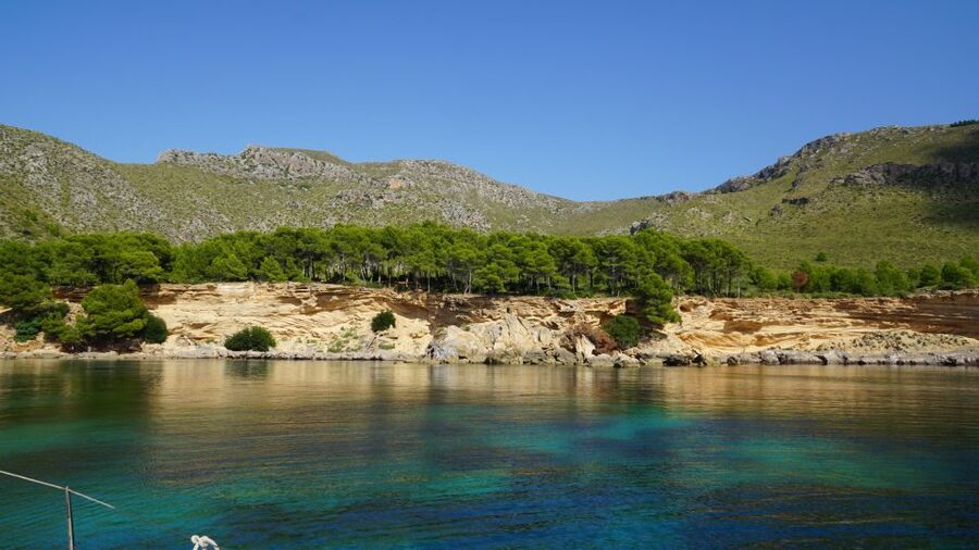 Alcudia: Sailing Yacht Excursion with Wine & Tapas - Cala en Gossalba in Pollença: Photos, Break Time, and Water Fun