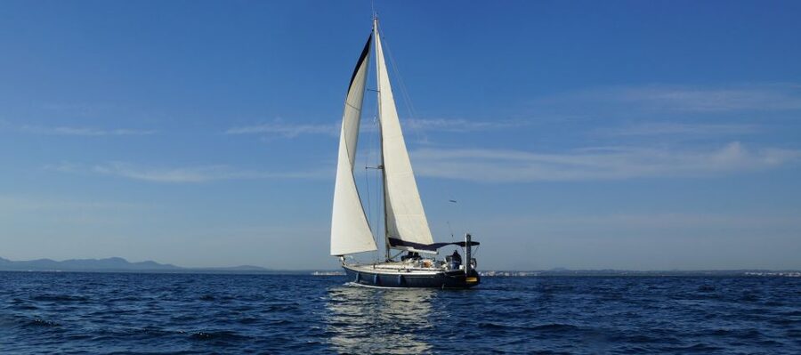 Alcudia: Sailing Yacht Excursion with Wine & Tapas - Aboard the 14 m Yacht: Comfort, Crew Energy, and Taking the Helm