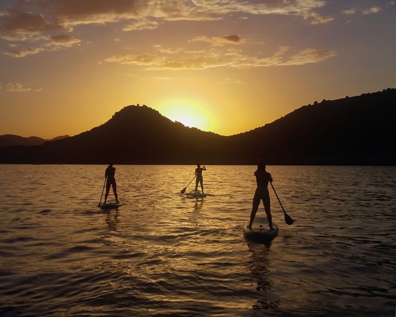 Cala Rajada: Stand Up Paddle Sunset Tour - Paddling into the sunset at Cala Agulla in quiet water