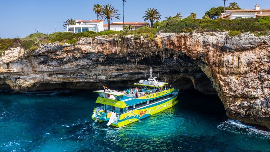 From Calas de Mallorca: Scenic Glass Bottom Boat Tour - The Coastline You Pass: Pirate Cave, Sea Caves, and White-Sand Bays