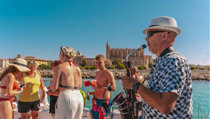 From Magaluf: Palma Bay Sightseeing Cruise with Live Music - Onboard comfort and live saxophone: the vibe is the product