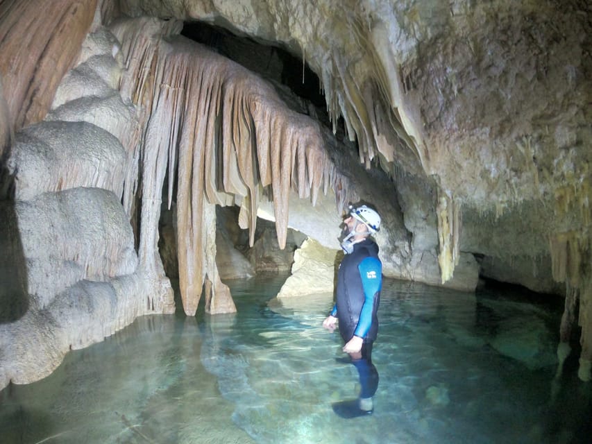 Mallorca: Cala Romántica Cliff Hike and Sea Cave Tour - Inside the Sea Cave: Helmet, Harness, Headlamp, and Columns