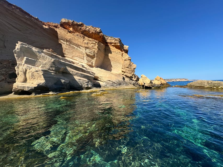 Mallorca: Caló des Moro and Cala Marmols Boat Tour - Passing the coast like a local: caves, contraband, and marés stone