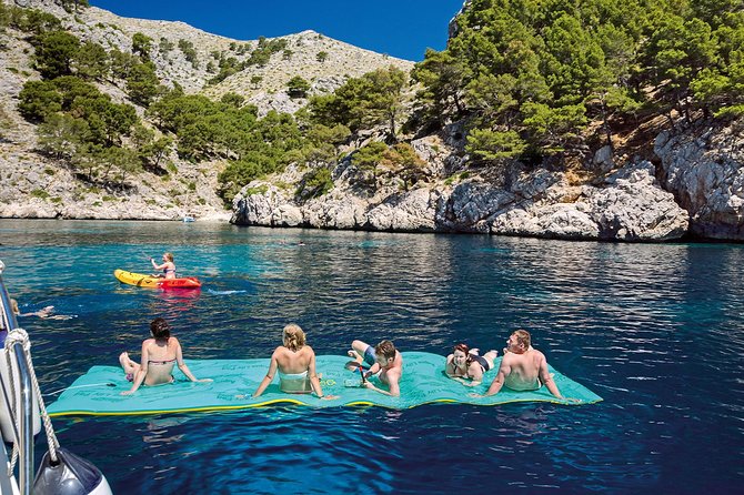 Mallorca Catamaran Cruise with Scenic Views and BBQ Lunch - Stop 4: Aucanada Lighthouse area for quick photos and a final cool-off