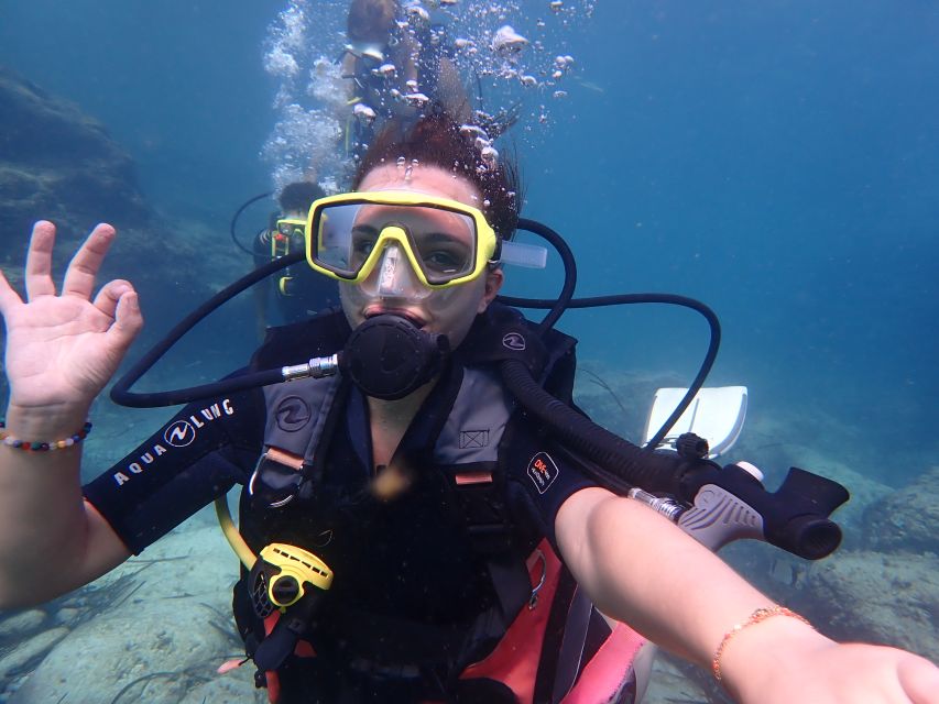 Mallorca: Discover Scuba Diving for Beginners - Where you go in Mallorca: protected reserve, shore steps, and the fish-and-cave payoff