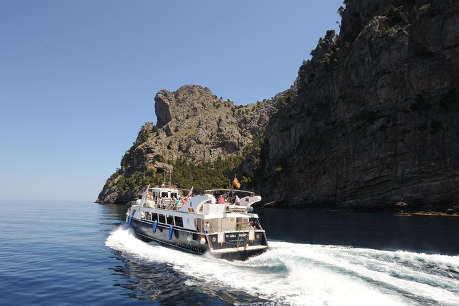 Mallorca in One Day Sightseeing Tour with Boat Ride and Vintage Train - Sa Calobra free time: the tunnel walk and the beach reality