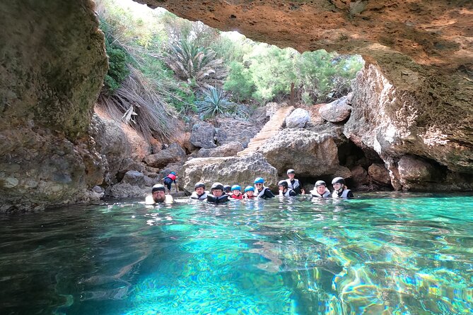 Mallorca: Kayaking, Sea Cave, Cliff Jumping & Snorkel Tour - Coastal trek and optional cliff jumping: fun, not compulsory