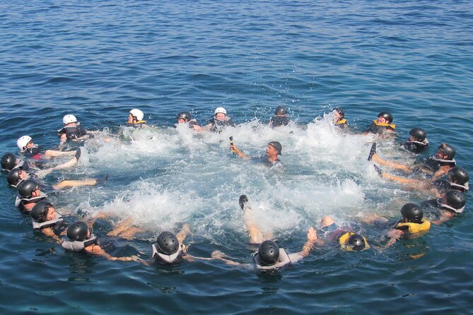 Mallorca: Kayaking, Sea Cave, Cliff Jumping & Snorkel Tour - Snorkeling in clear Mediterranean water and the sunken treasure hunt