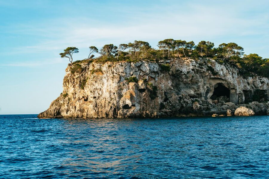 Mallorca: Midday or Sunset Sailing with Snacks and Open Bar - Secret swim stop in turquoise water: paddleboard, snorkel gear, and the platform