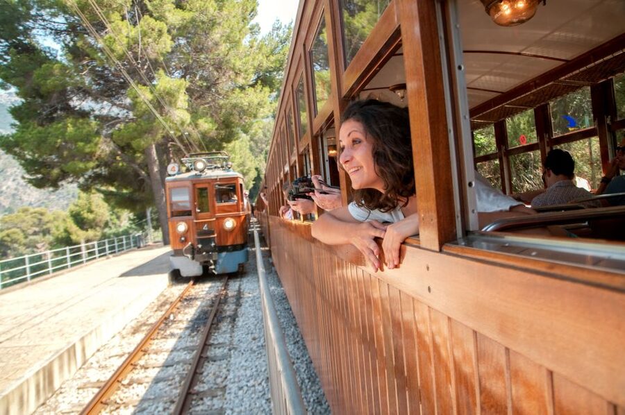 Mallorca: Scenic Full-Day Tour from the North - The antique wooden train from Sóller, classic rail feel through groves