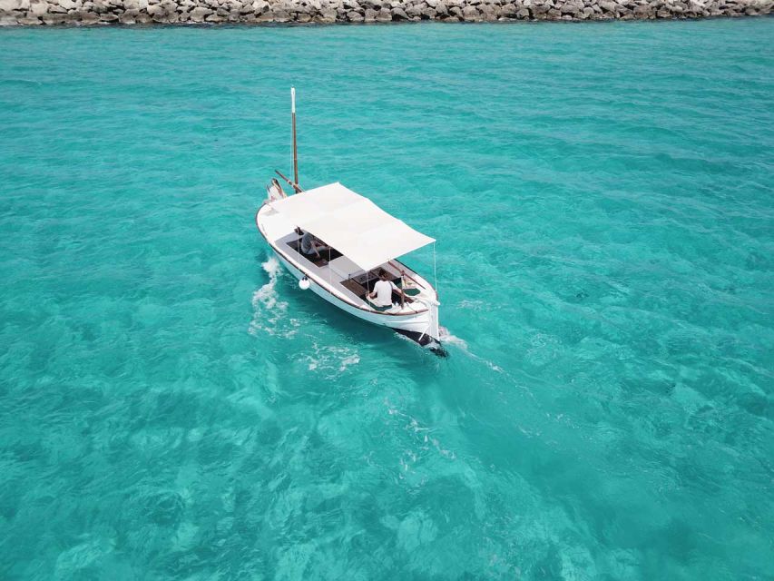 Mallorca: Southern Beaches Private Llaut Boat Tour - Getting to Club Nàutic Sa Ràpita and Dock H