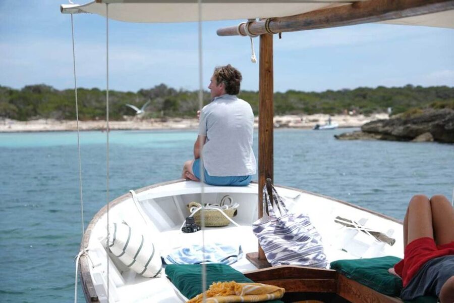 Mallorca: Southern Beaches Private Llaut Boat Tour - The 1973 wooden Llaut experience: shade, comfort, and a real captain