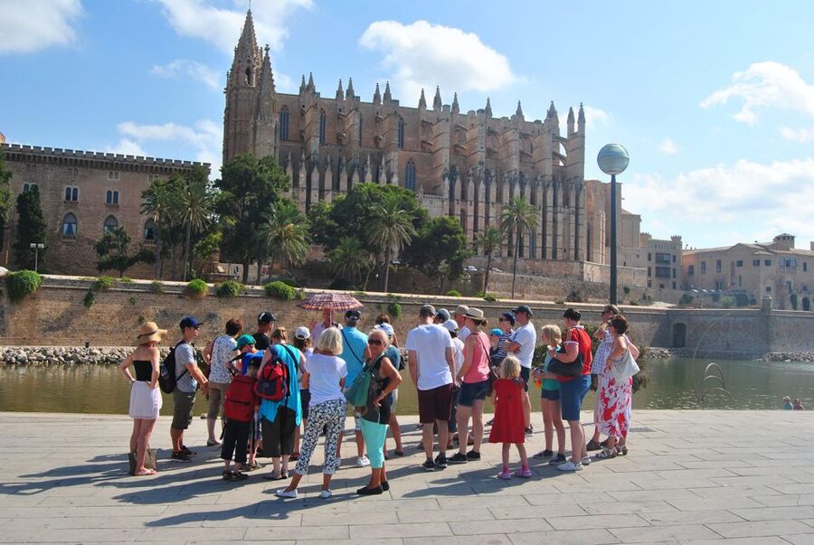 Palma de Mallorca: City Walking Tour with The Cathedral - Through the historic center: Parliament, Plaza de Cort, and quiet details