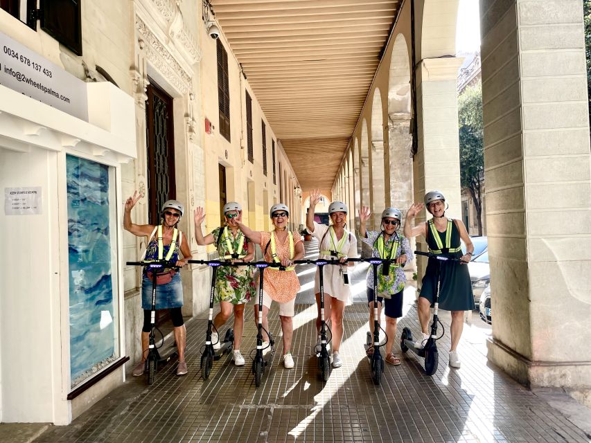 Palma: Guided 1.5 H city tour on Electric scooter - Starting Near Palma Cathedral and LAlmudaina, Then Learning the Scooter