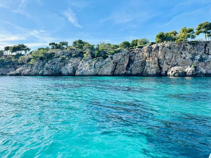 Palma: Private Boat Tour in Mallorca with Snorkel and Paddle - What happens during the cruise, the aperitif, and the water stops