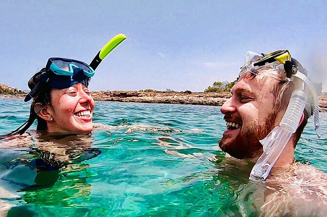 Private Boat Tour from Palma with Snorkeling and Paddle Surfing - Caves, coast views, and photo spots without the crowd