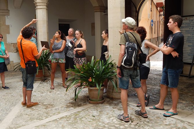 Private walking tour in Palma de Mallorca with local guides. - Catedral de Mallorca, exterior clues, then interior surprises