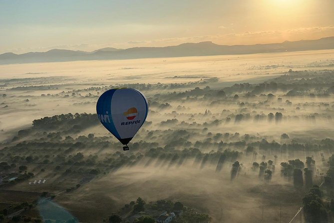 Romantic Sunrise Balloon Tour in Majorca - After landing: the baptism moment and optional breakfast