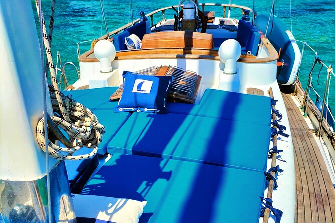 Sailing Flavors, Gastronomy and Relaxation at Sea - Leaving Palma: Cathedral views, busy marina traffic, and big-name sailboats