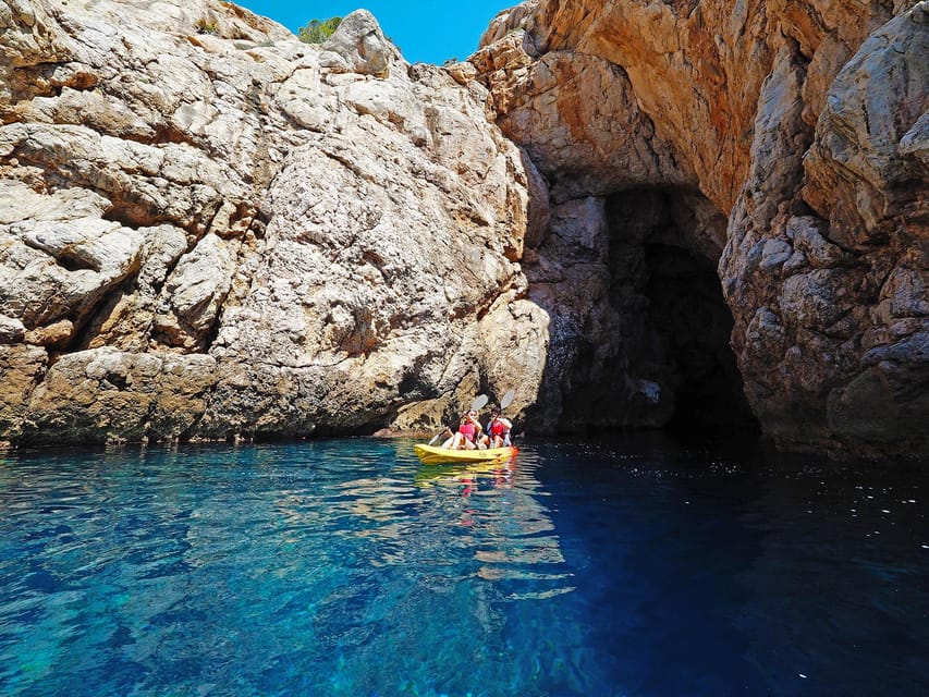 Sant Elm: Guided kayak tour to Cala en Tío with caves - Paddling Out From Sant Elm: Steep Cliffs, Punta de na Galinda, and Big Views