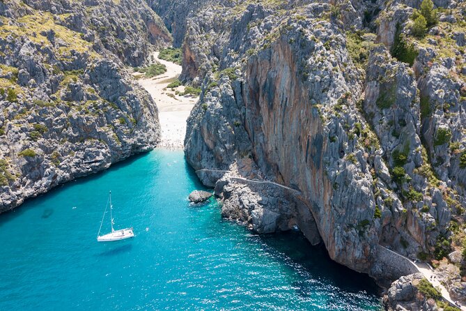 Scenic tour by Train, Tram and Boat through the lakes - Entering the Serra de Tramuntana, with reservoirs and World Heritage views