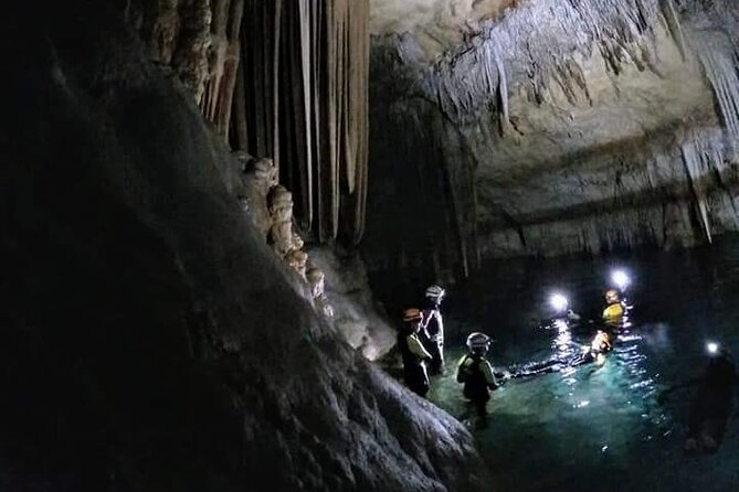 Small-Group Cova de Coloms Sea Caving Tour in Mallorca - Wetsuit moment and the swim-out start