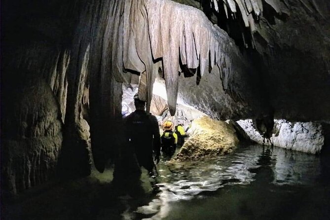 Small-Group Cova de Coloms Sea Caving Tour in Mallorca - Inside Cova de Coloms: formations, lakes, crawling, and ducking