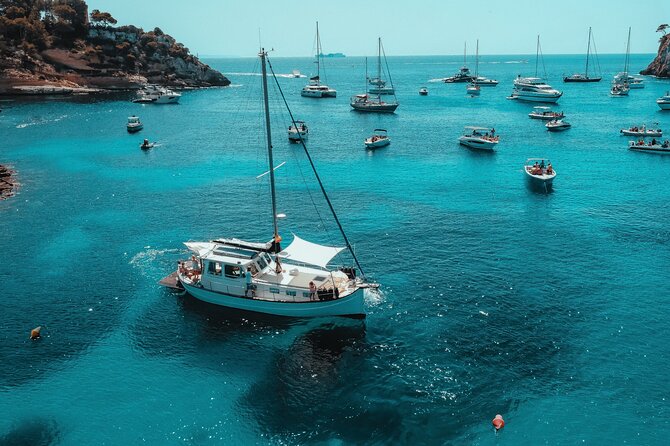 Traditional Mallorquin Llaut Cruise with Tapas and Drinks - Swim Setup: Paddle Boards, Snorkel Gear, and an Inflatable Platform